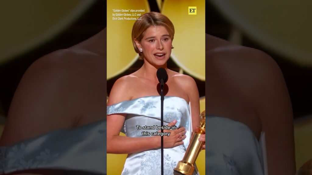 Jessie Buckley gets a hug from her hero Julia Roberts on the way up to the #goldenglobes stage 🥹🥰