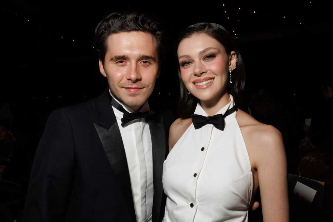 FILE - Brooklyn Beckham, left, and Nicola Peltz attend the Victoria Beckham Spring/Summer 2025 collection presented in Paris on Sept. 27, 2024.