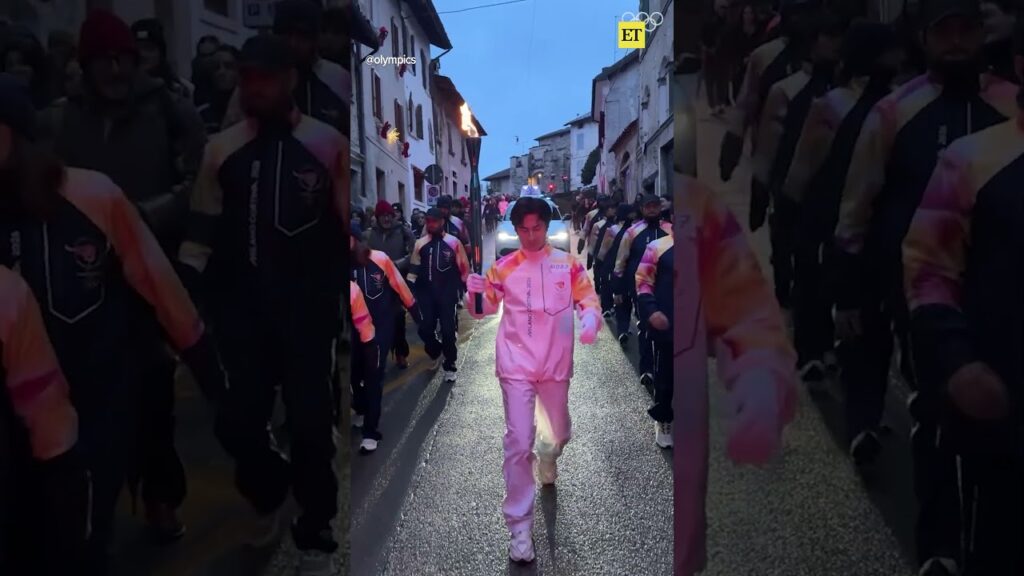 Hudson Williams and Connor Storrie Carry #winterolympics Torch in Italy #heatedrivalry