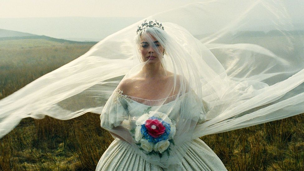 Margot Robbie in a wedding dress as Catherine in "Wuthering Heights" (Credit: Warner Bros. Pictures)