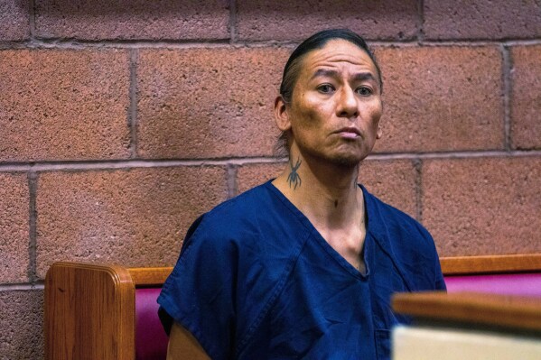 Nathan Chasing Horse sits in court, Feb. 8, 2023, in North Las Vegas, Nev. (AP Photo/Ty O'Neil, File)