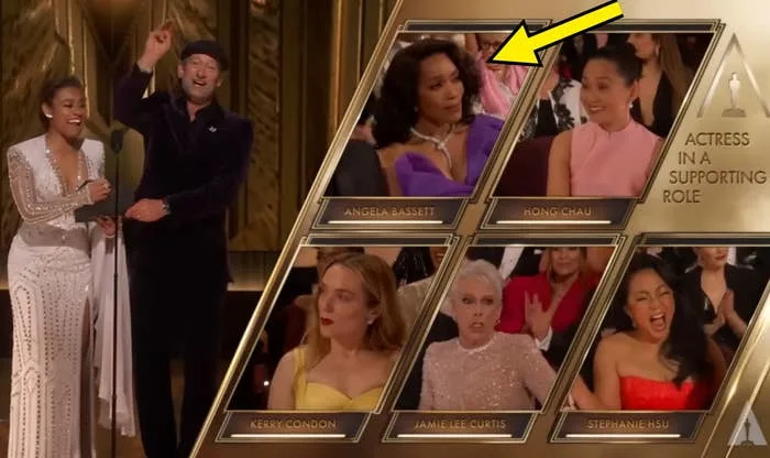 Arrow pointing at Angela Bassett's reaction to Jamie Lee Curtis winning an Oscar