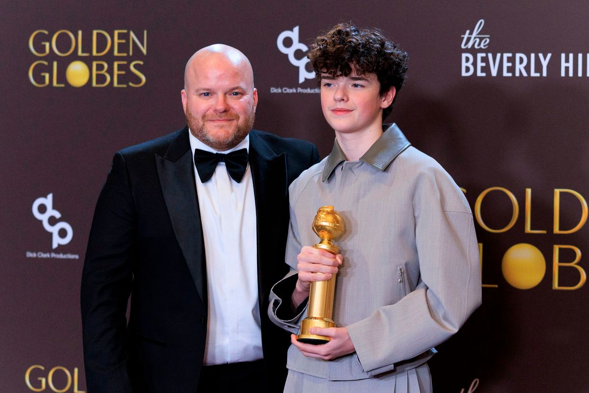 The actor, pictured with his dad, won a Golden Globe Awards - at just 16
