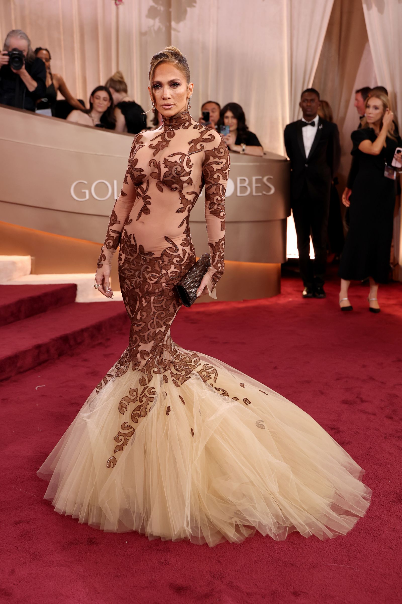 Image may contain Jennifer Lopez Jenn Mann Hua Guofeng Kate Berlant Fashion Adult Person Clothing and Dress