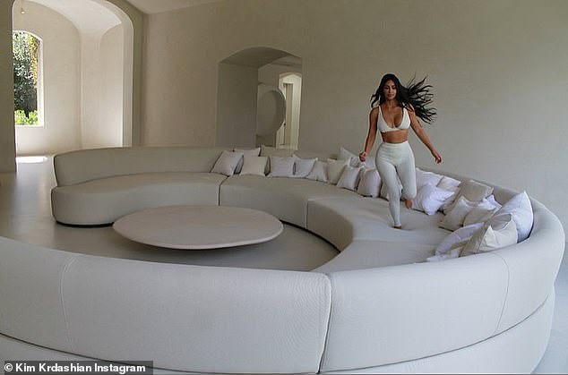 The reality star and businesswoman shared another snap running around her sofa on Instagram; the table was designed by Axel