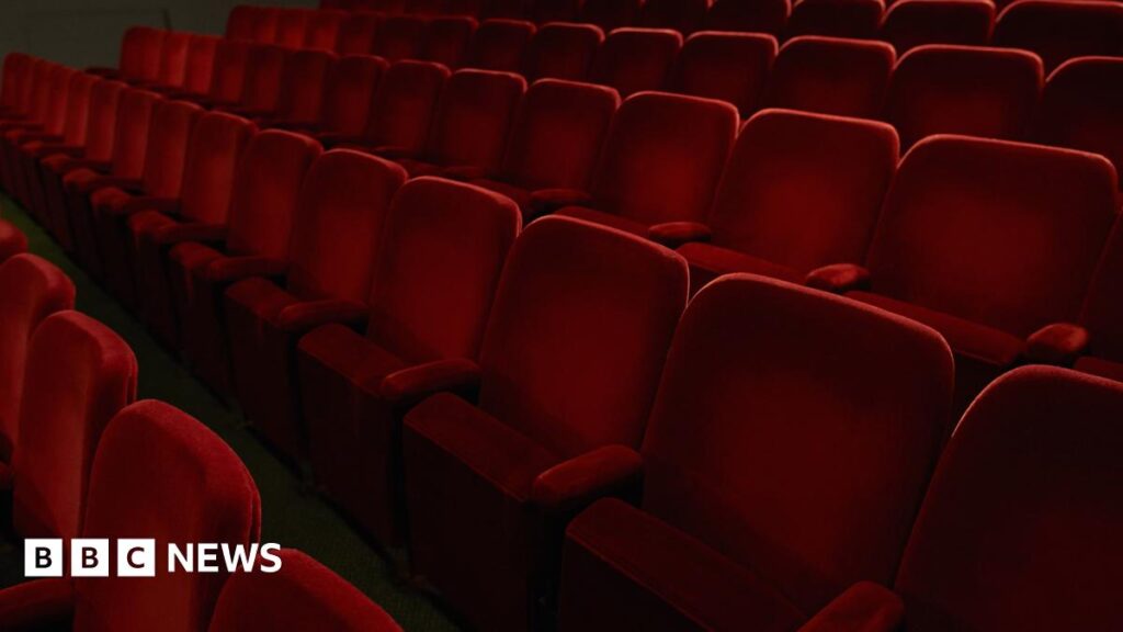 rows of red velvet theatre seats