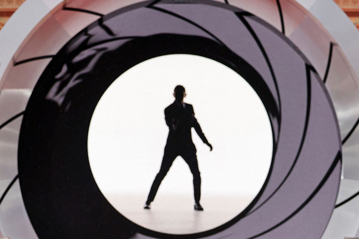 A photo taken on September 28, 2021 shows a projected image of British actor Daniel Craig during the World Premiere of the James Bond 007 film "No Time to Die" at the Royal Albert Hall in west London.