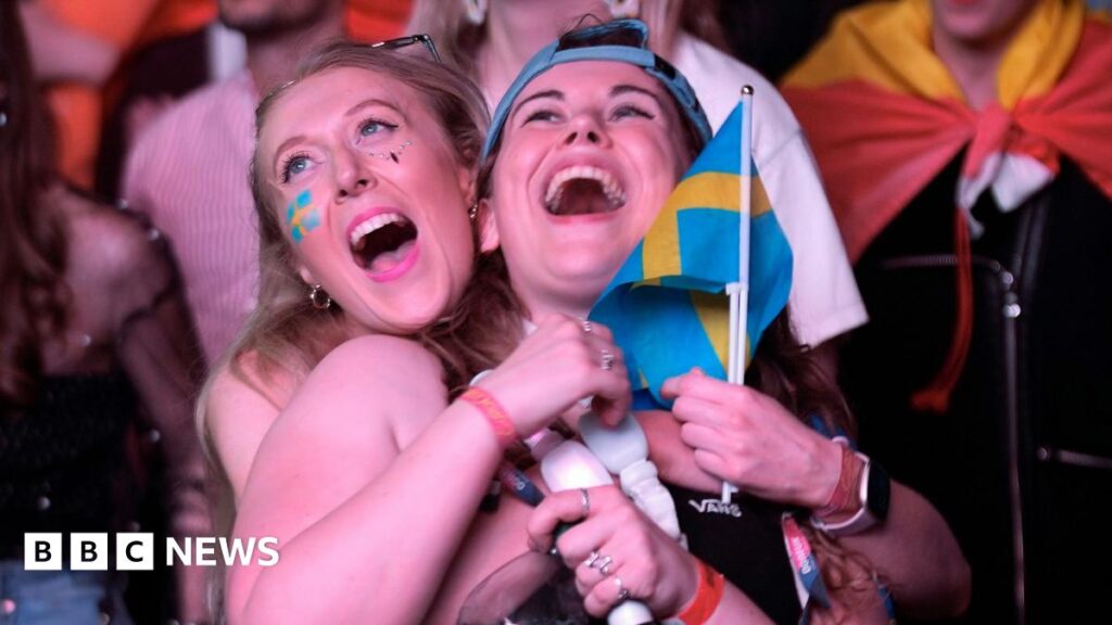Eurovision Song Contest announces live tour to celebrate 70th birthday Eurovision fans enjoy the party atmosphere as they watch the Eurovision Song Contest final on a giant screen in the Eurovision Village on May 13, 2023 in Liverpool, England.