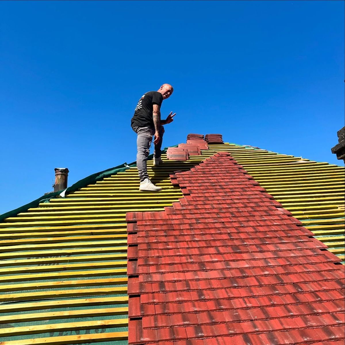 John Hendy working as a roofer