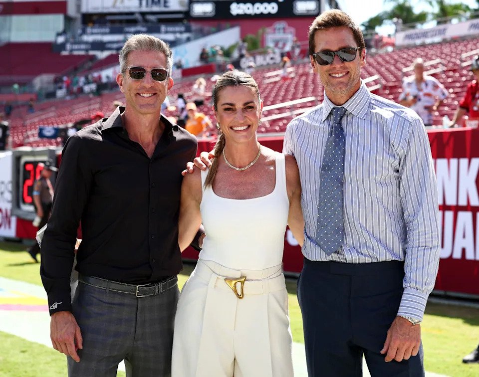 TAMPA, FL - SEPTEMBER 29: Fox Sports commentators Kevin Burkhardt, Erin Andrews, and Tom Brady pose for a photo prior to an NFL football game between the Tampa Bay Buccaneers and the Philadelphia Eagles at Raymond James Stadium on September 29, 2024 in Tampa, Florida. (Photo by Kevin Sabitus/Getty Images)Kevin Sabitus&sol;Getty Images
