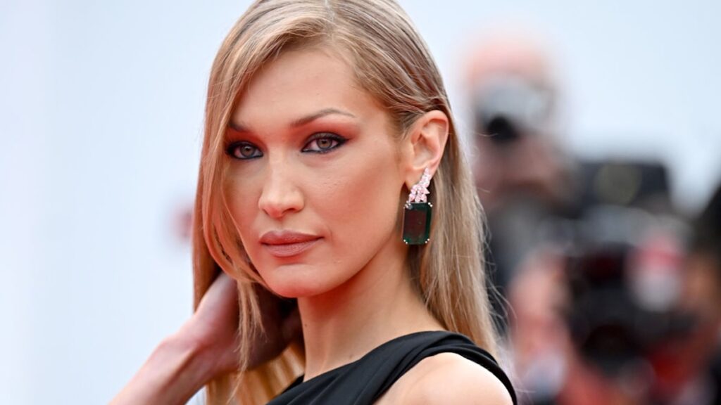 Bella Hadid wears very daring black cocktail dress with racy cut-outs