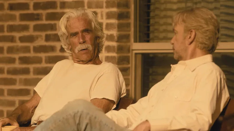 Billy Bob Thornton's Tommy Norris sits beside Sam Elliott's T.L. Norris as they converse in Landman