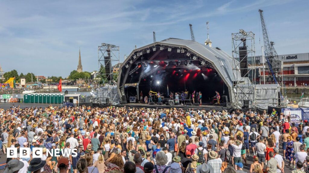 2026 festival guide: Everything you need to know A large crowd watching a band performing on the Harbour Festival's main stage during the day