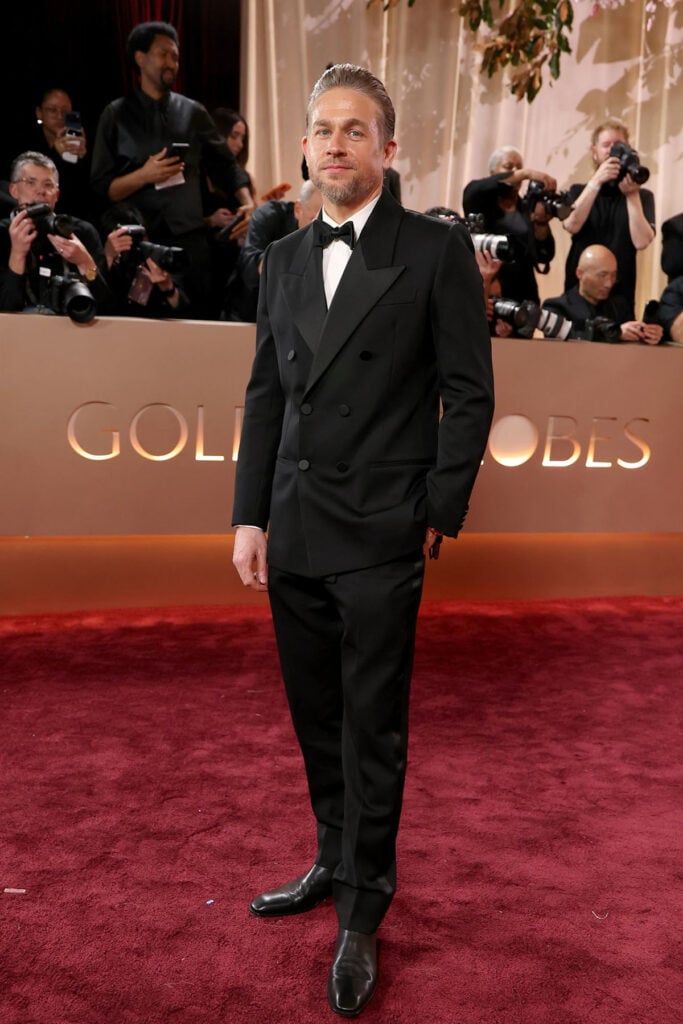 Charlie Hunnam, Charlie Hunnam Saint Laurent, Charlie Hunnam Golden Globe Awards, Saint Laurent tuxedo, classic menswear red carpet, 2026 Golden Globe Awards fashion