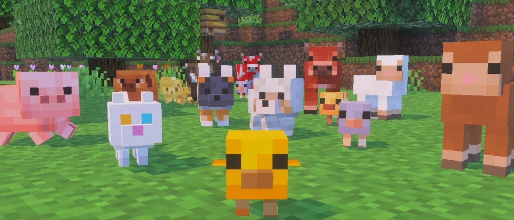 Several baby chickens, wolf pups, kittens, piglets, lambs, and calves facing the screen