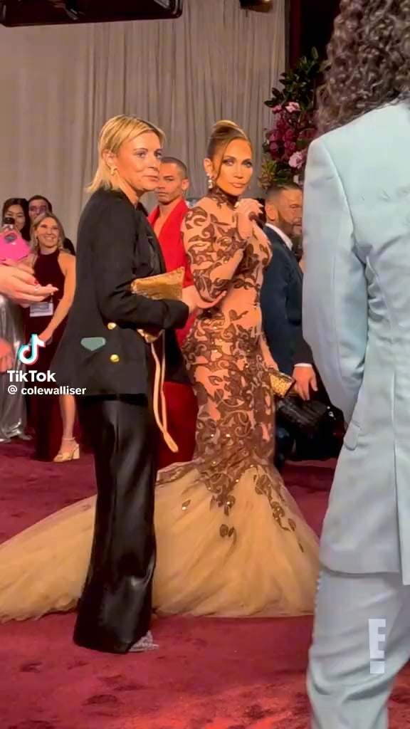 Jennifer Lopez is receiving backlash for her interaction with Cole Walliser (the glambot guy) at the Golden Globes.