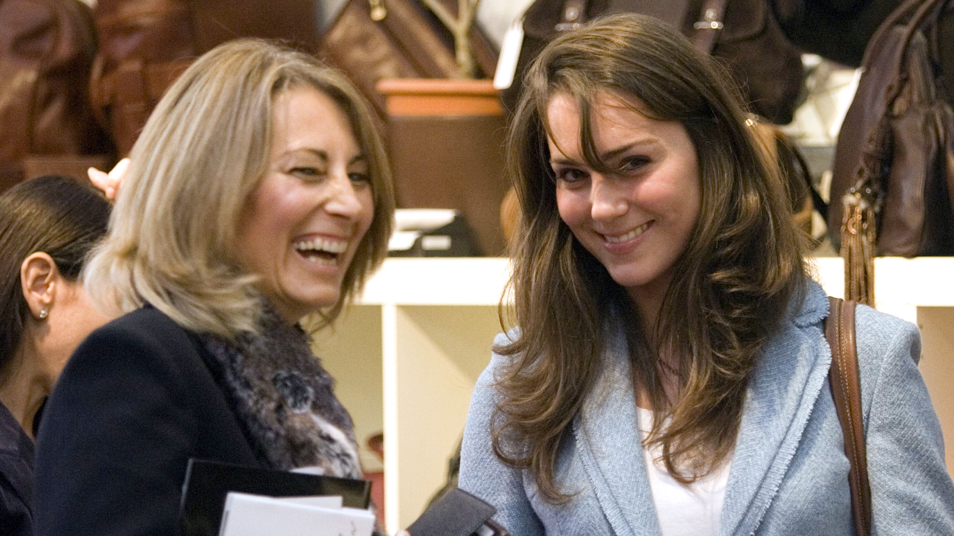 Carole Middleton has blonde hair and laughs while shopping with daughter Kate Middleton