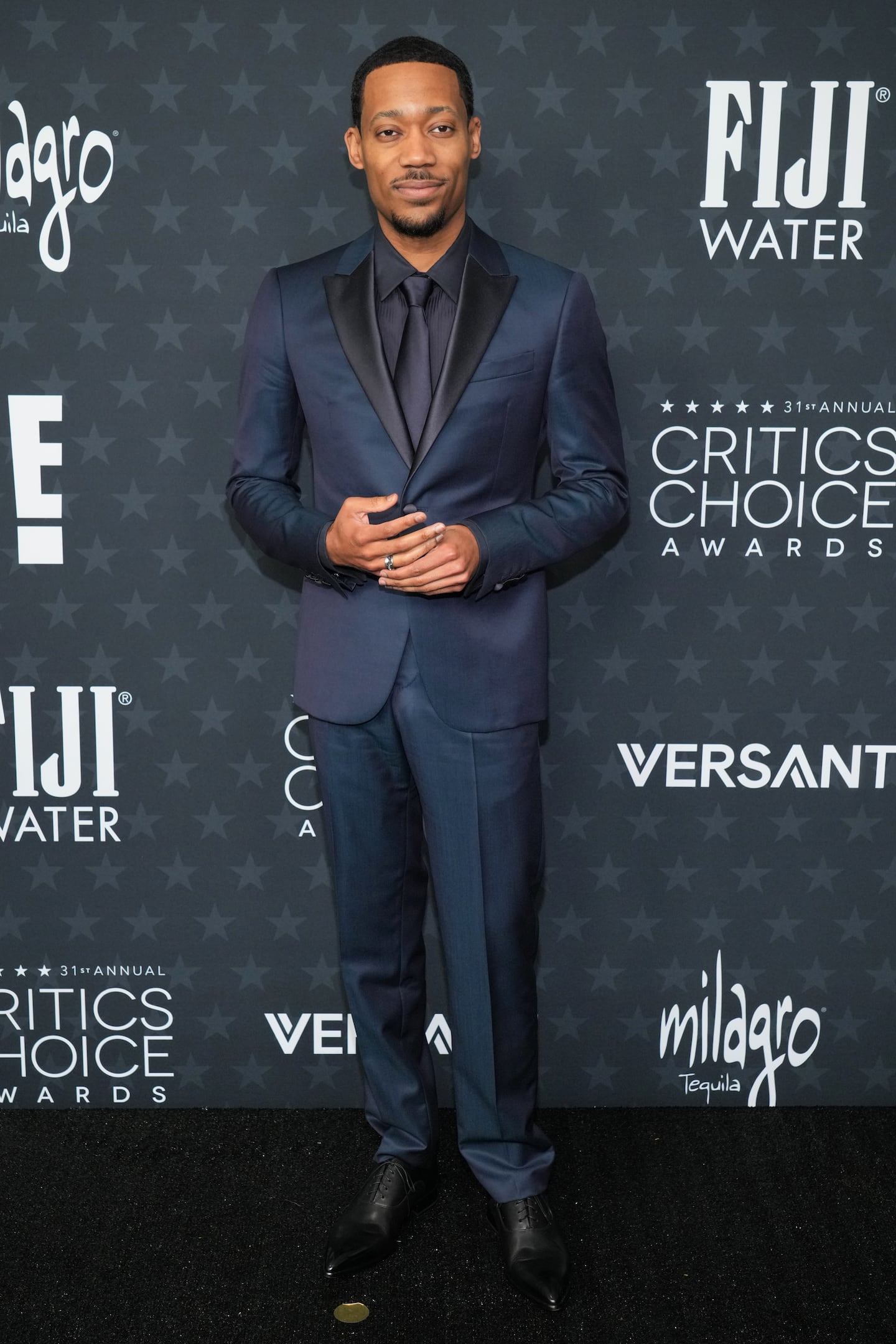 Tyler James Williams arrived at the 31st Annual Critics Choice Awards on Sunday at The Barker Hanger in Santa Monica, Calif.