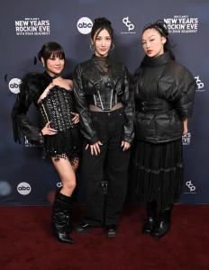 In this image released on December 31, 2025, Rei Ami, EJAE, Audrey Nuna of KPOP Demon Hunters: The Singing Voices of HUNTR/X arrives at "Dick Clark's New Year's Rockin' Eve with Ryan Seacrest" 2026.