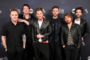 In this image released on December 31, 2025, Eddie Fisher, Zach Filkins, Ryan Tedder, Brent Kutzle, Drew Brown and Brian Willett of One Republic arrives at "Dick Clark's New Year's Rockin' Eve with Ryan Seacrest" 2026.