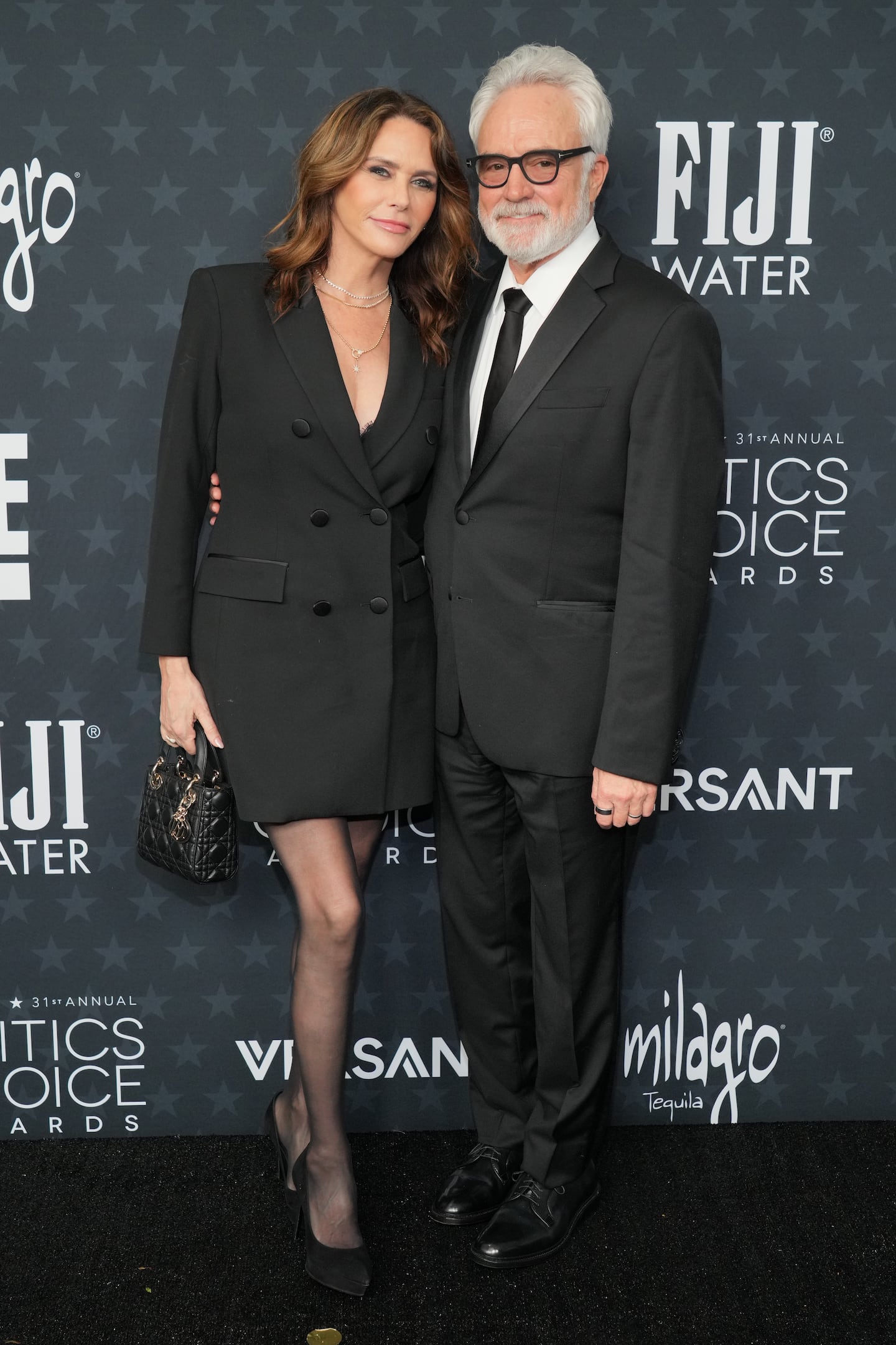 Amy Landecker, left, and Bradley Whitford  arrived at the 31st Annual Critics Choice Awards on Sunday at The Barker Hanger in Santa Monica, Calif.
