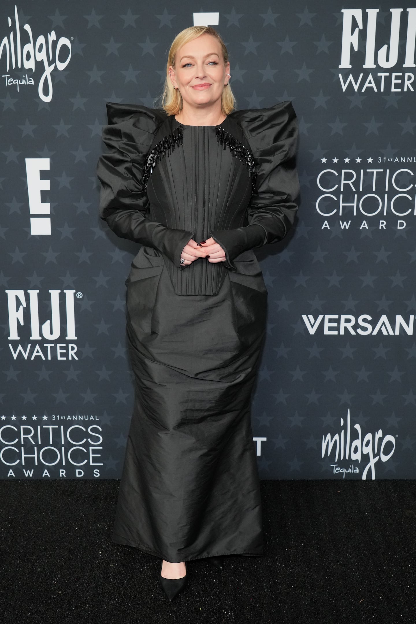 Christine Tremarco arrived at the 31st Annual Critics Choice Awards on Sunday at The Barker Hanger in Santa Monica, Calif.
