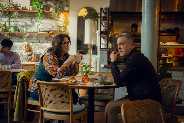 Run Away James Nesbitt and Ruth Jones in Run Away, sat at a table together drinking coffee.