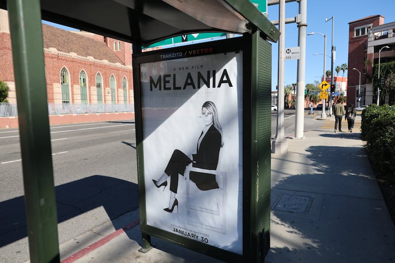 A view of a defaced bus stop advertisement for the new documentary film about First Lady Melania Trump at Exposition Park in Los Angeles.
