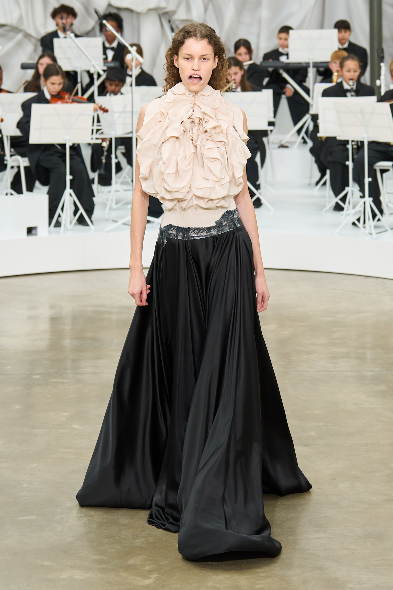 A model wore Kylie Jenner's top and skir on the Maison Margiela Spring 2026 runway