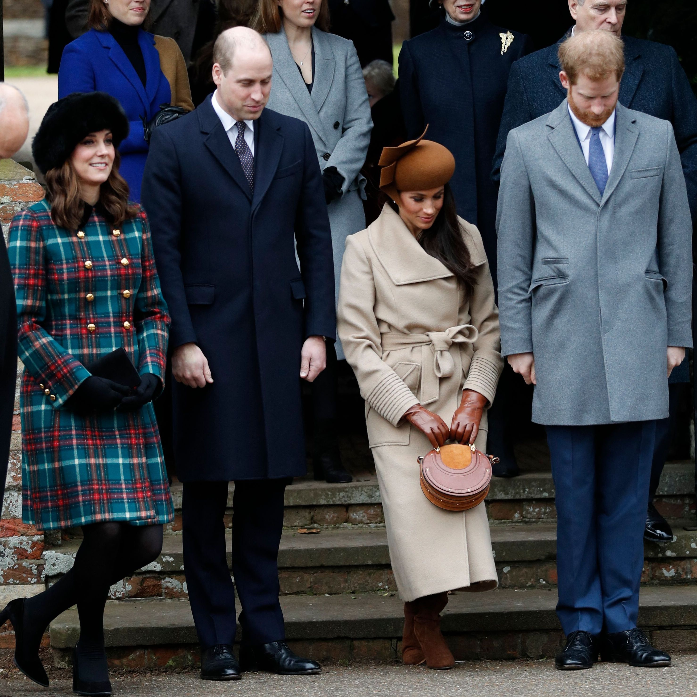 US actress and fiancee of Britain's Prince Harry Meghan Markle (2R) and Britain's Catherine, Duchess of Cambridge, (L) curtsey flanked by Britain's Prince William, Duke of Cambridge (2L), and Britain's Prince Harry (2R) who bow as they see off Britain's Queen Elizabeth II