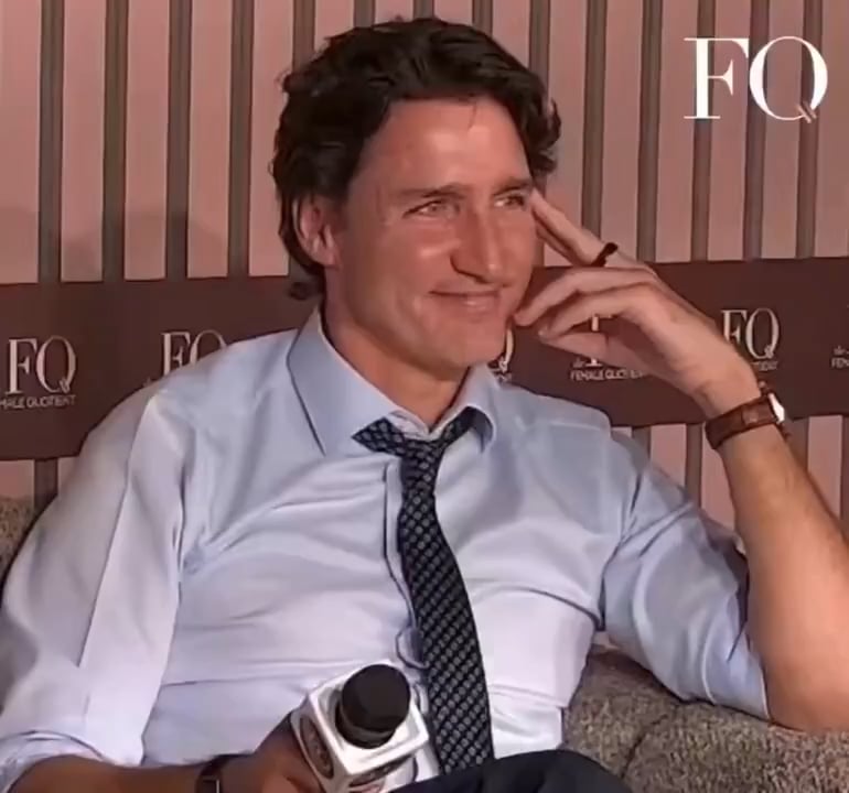 Katy Perry and Justin Trudeau sending each other secret love signals during the World Economic Forum!