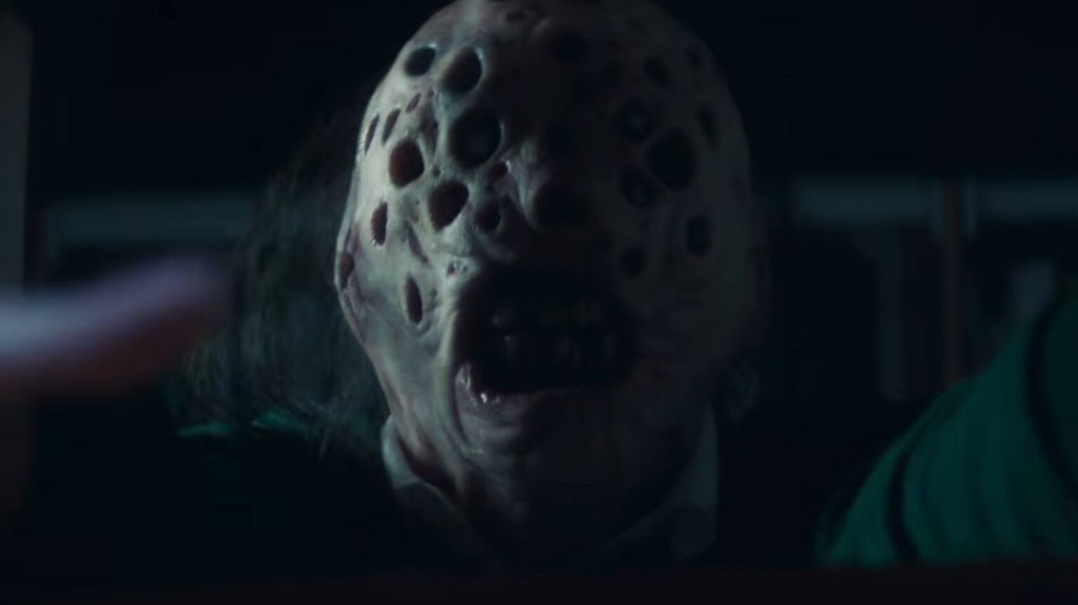 Longlegs and Stranger Things stars’ horror anthology movie gets creepy first trailer Monster man with multiple holes in his head grabbing at camera in Blood Covenant