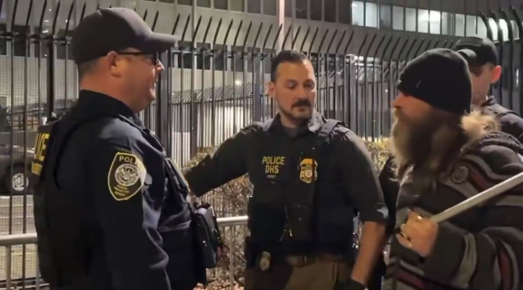 The protesters set up a memorial for Renee Good, and an ICE officer responded by stomping on the memorial candles. A protester immediately confronted him, saying, “Really, you f*ckin’ punk? That’s why we’re here… Renee Good is a mother.”