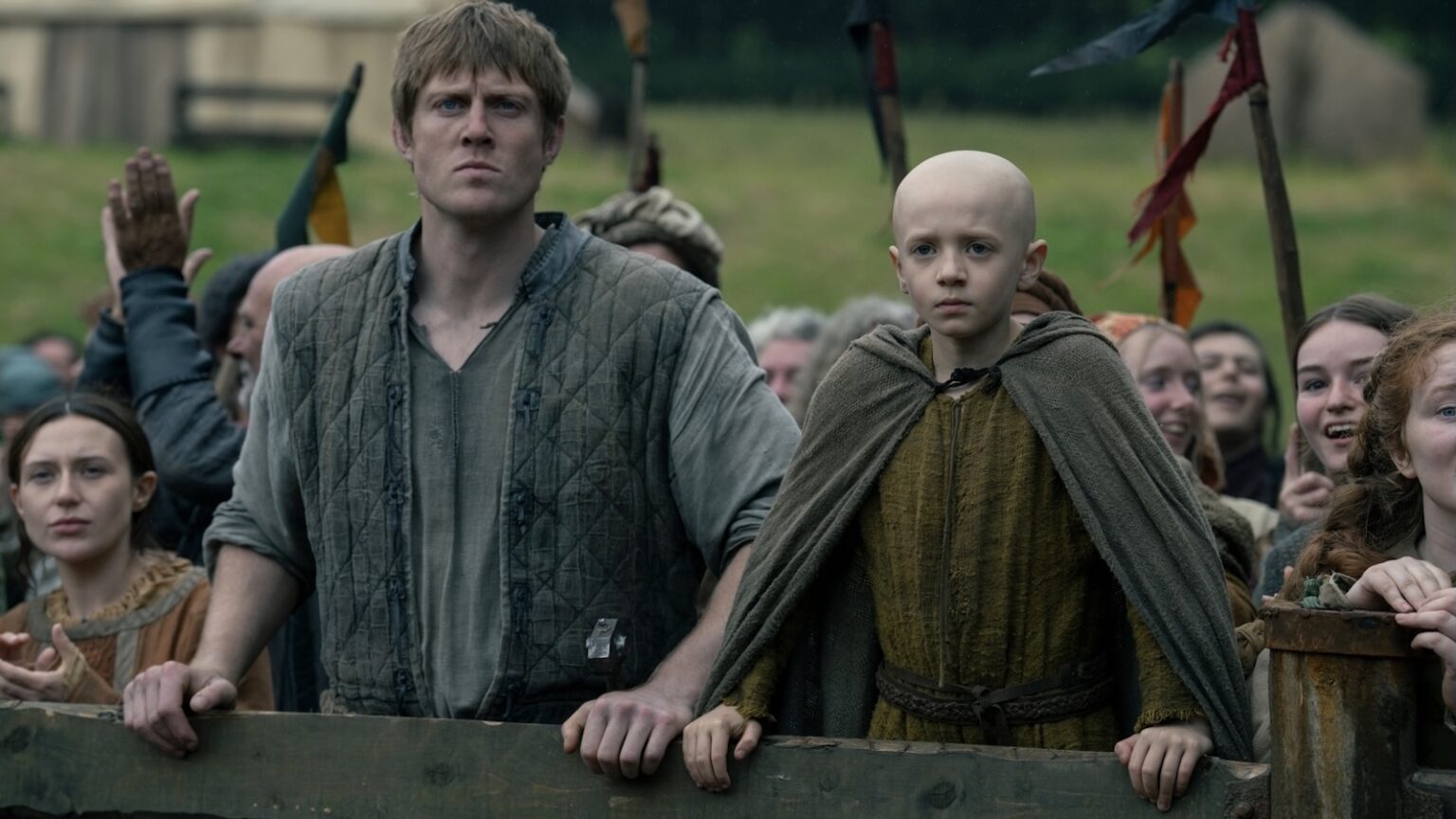 Dunk (Peter Claffey) and Egg (Dexter Sol Ansell) watching a tourney in A Knight of the Seven Kingdoms