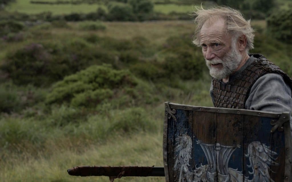 Ser Arlan of Pennytree (Danny Webb) wielding his sword and shield in A Knight of the Seven Kingdoms