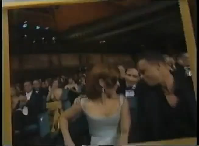 Gillian Anderson kissing her co-star David Duchovny before her boyfriend the night she won her first Emmy for the X-Files