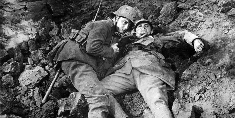 Paul lays on a hill in All Quiet on the Western Front