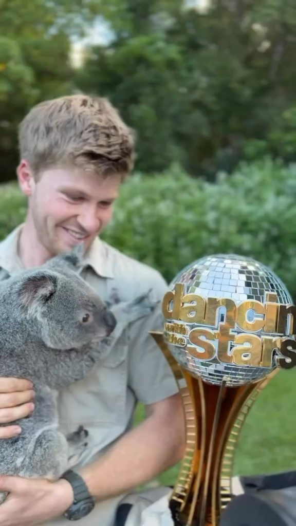 DWTS champ Robert Irwin brings his mirrorball home to the Australian Zoo to meet his friends