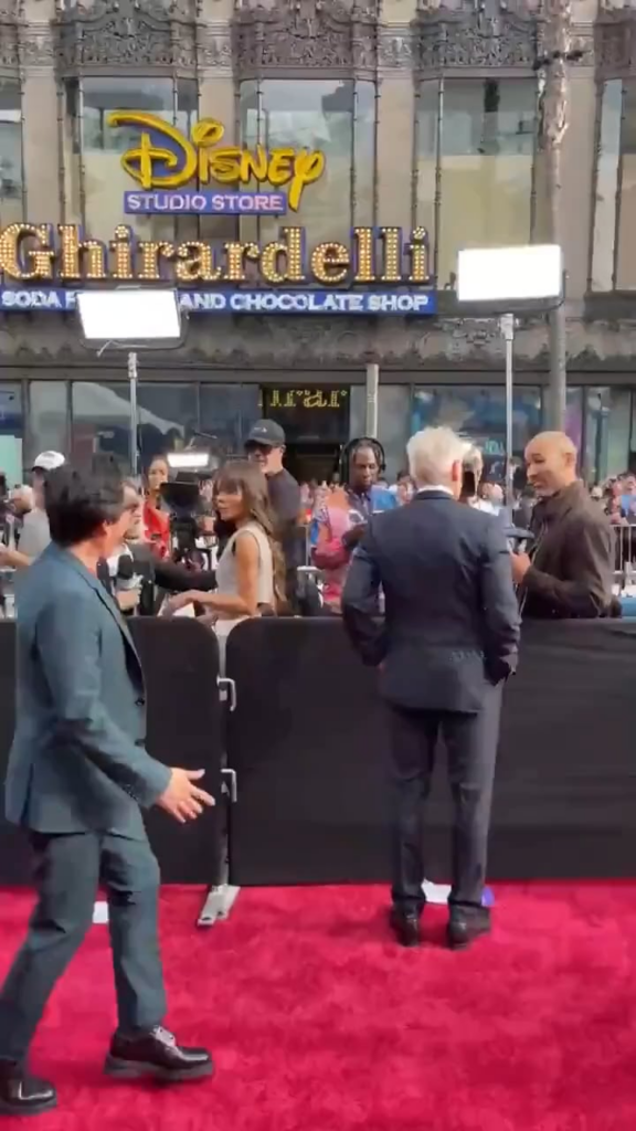 A beautiful moment at the Indiana Jones and the Dial of Destiny premiere when Ke Huy Quan catches Harrison Ford completely off guard