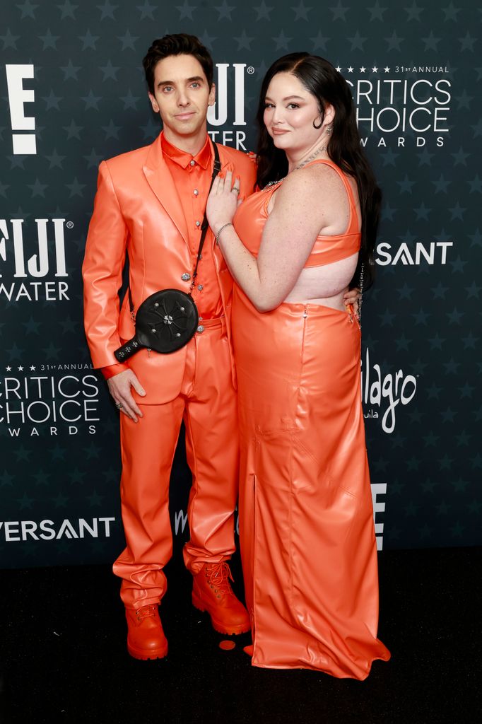 Paul W. Downs and Megan Stalter attend the 31st Annual Critics Choice Awards at Barker Hangar on January 04, 2026 in Santa Monica, California.