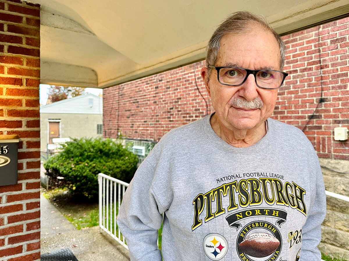Barry Werber, a survivor of the Tree of Life massacre, on his porch at his home in Pittsburgh.