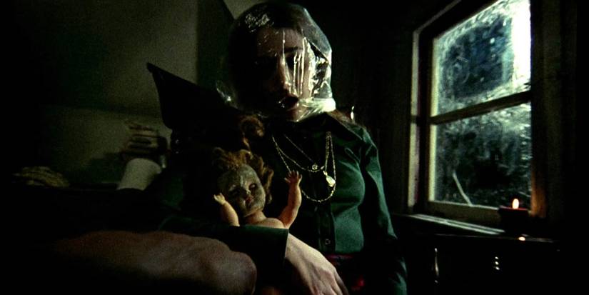 Clare (Lynne Griffin) dead in the attic with a plastic bag over her head in 'Black Christmas'
