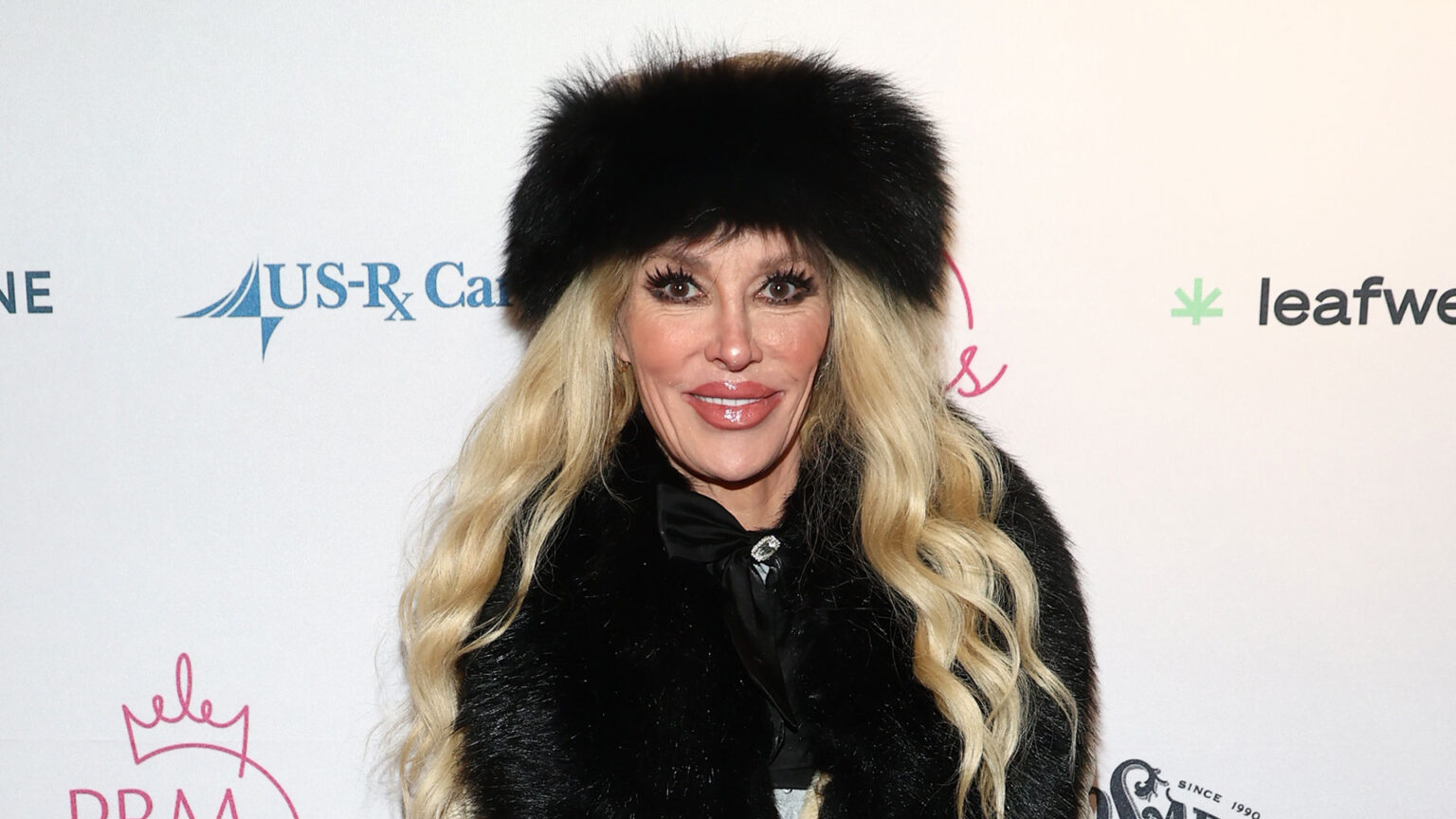RHOBH's Brandi Glanville makes rare red carpet appearance after she claims a parasite disfigured her face