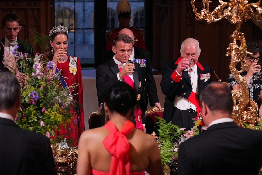 Britain's King Charles, President of France Emmanuel Macron, Britain's Catherine, Princess of Wales, toast at the State Banquet