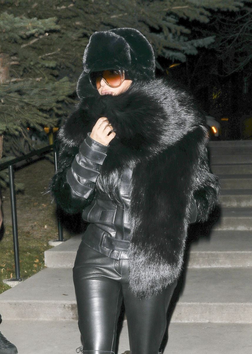 Over that, dramatic fur accents were layered across the shoulders and chest, creating texture and volume that felt bold and intentional.