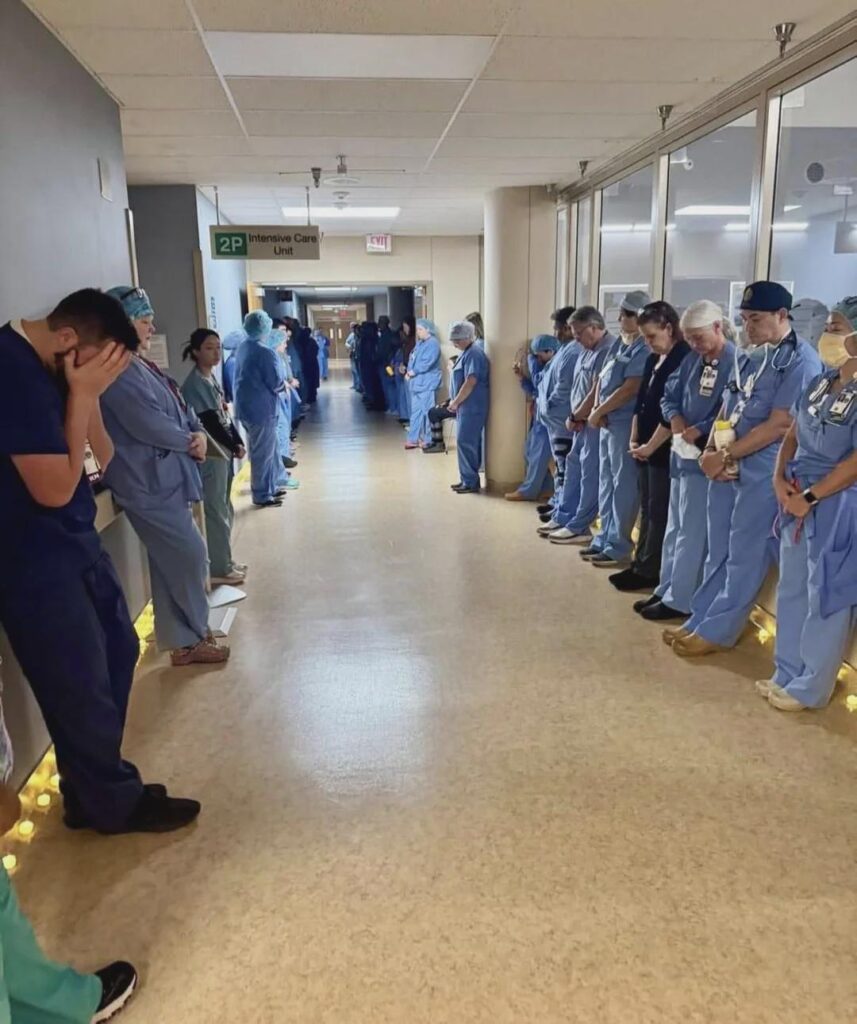 Alex Pretti’s coworkers take a moment of silence this morning.