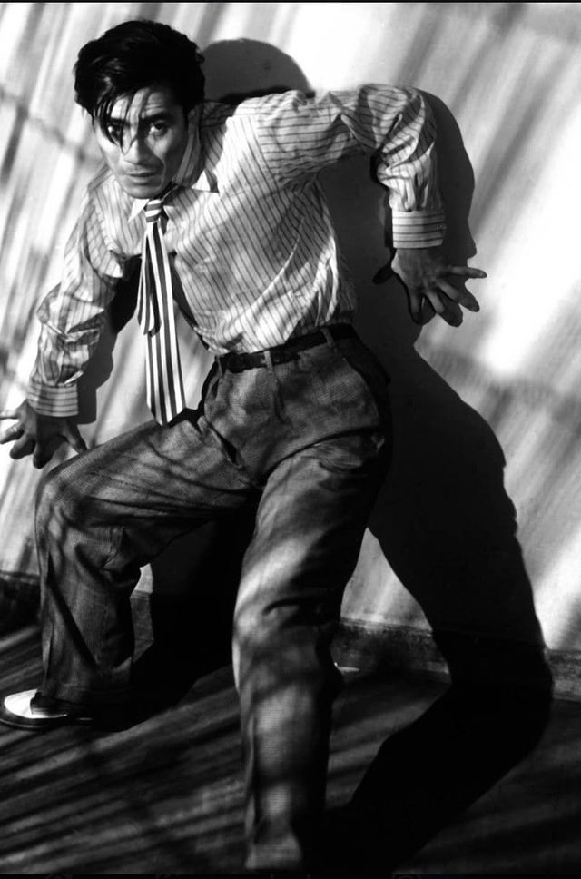 Japanese actor Toshiro Mifune (1920-1997) who started Akira Kurosawa films include seven samurai (1954) and Yojimbo (1961).