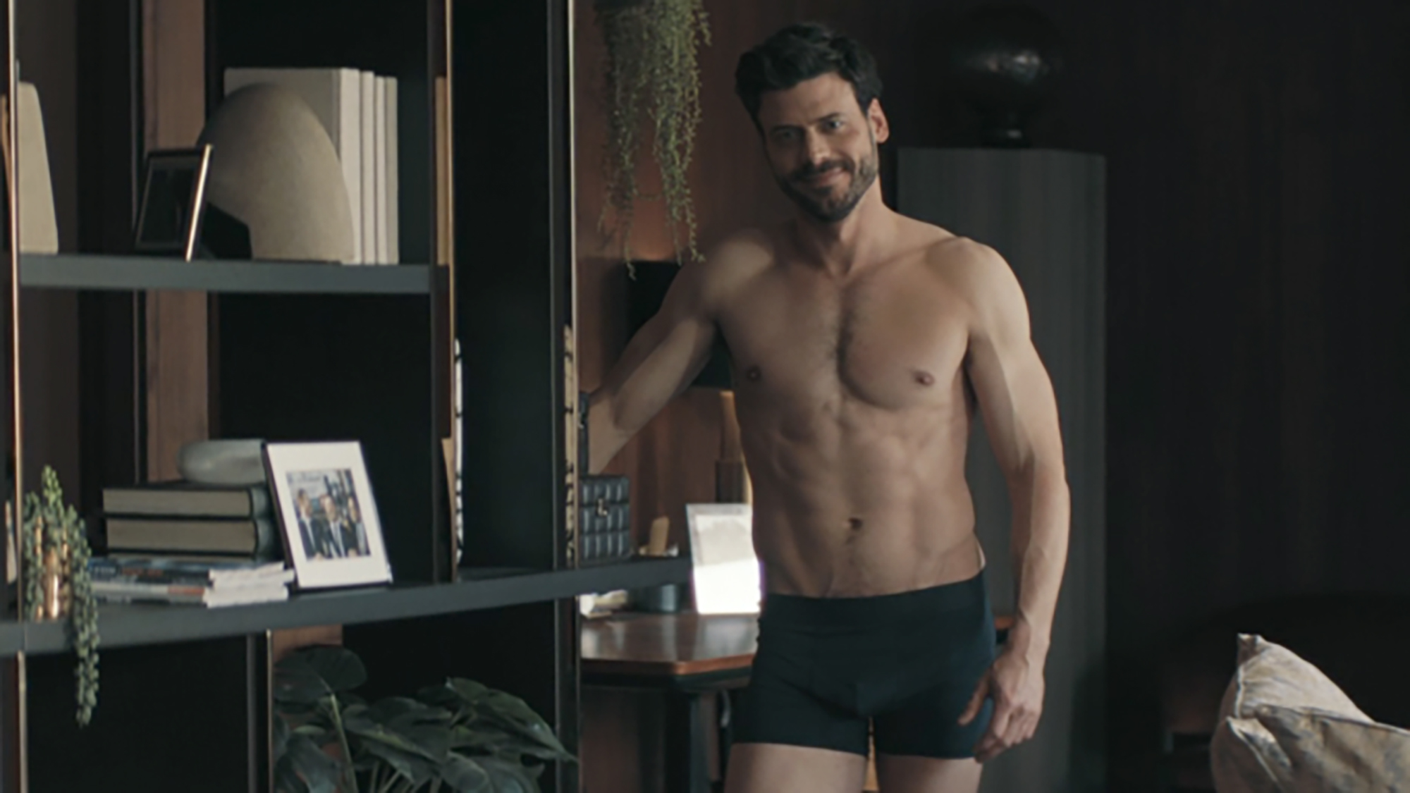 Francois Arnaud in black boxer briefs.