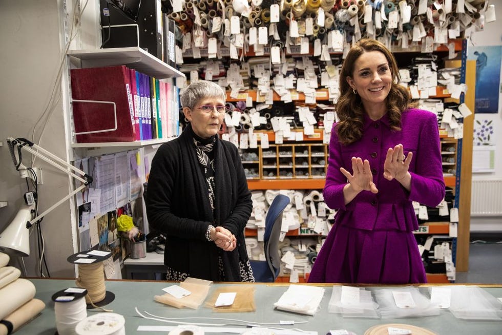 britains catherine, duchess of cambridge, (r) talks with stock room supervisor morag beaton (l) during a visit to the costume department at the royal opera house in london on january 16, 2019. the royal opera house costume department is responsible for creating, refurbishing and conserving thousands of opera and ballet costumes per season, with up to 600 costumes per production. (photo by heathcliff omalley / pool / afp) (photo credit should read heathcliff omalley/afp via getty images)