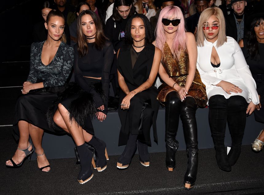 Celebs including Zoë Kravitz (center) and Kylie Jenner (in the pink wig) sit front-row at a Vera Wang runway show in 2016.